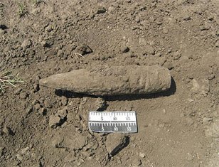 Житель Каховского района выкопал в собственном дворе снаряд