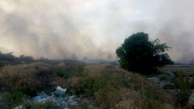 Задимлення і задуха: у Херсоні п’ятий день горить сміттєзвалище