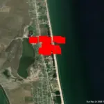 Супутникові знімки NASA FIRMS, що демонструють теплові аномалії та пожежі в Генічеській Гірці після удару по штабу ФСБ.