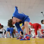 Діти займаються самбо в спортивному залі Великоолександрівської ДЮСШ