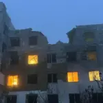 Будівля медичного закладу в Херсоні після російського обстрілу з пошкодженнями