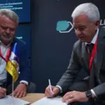 Представники Бучі, Челаковіце та Чорнобаївської громади підписують угоди про партнерство.