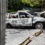 Пошкоджена автівка після атаки дрона в Херсоні