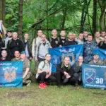 Оксана Москаленко з Херсонської ОДА спілкується зі звільненими з полону українськими морпіхами.