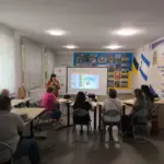 Учасники розмовного клубу в Житомирі під час заняття, присвяченого українським родинним традиціям