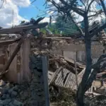 Наслідки російського обстрілу в Херсонській області, пошкоджені будівлі та транспорт