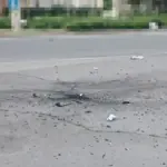 Наслідки атаки дронів у Херсоні, рятувальники надають допомогу постраждалим, пошкоджені будівлі