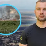 Поле згорілих зернових культур на Херсонщині, дим після пожежі, на задньому плані техніка 5