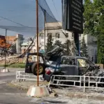 Пошкоджені будинки Херсона після російських обстрілів