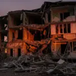 Пошкоджений будинок після атаки дрона, наслідки обстрілу в Херсоні