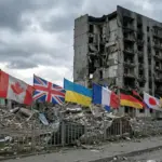 Прапори НАТО на саміті в Анкарі на тлі зруйнованого міста, 2026 рік