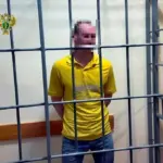 Зруйновані будівлі на тимчасово окупованій території Херсонщини, що символізують несправедливість та окупаційні суди